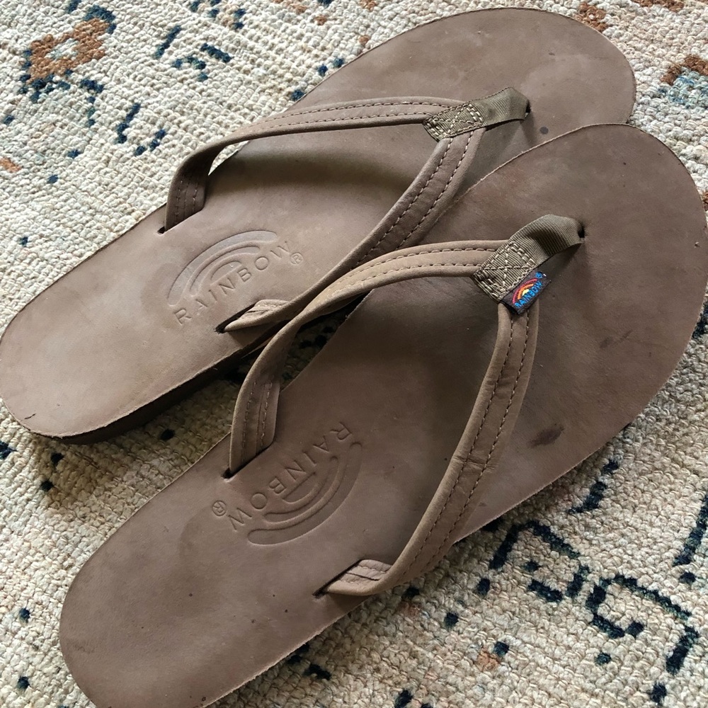 Rainbow leather flip flops.